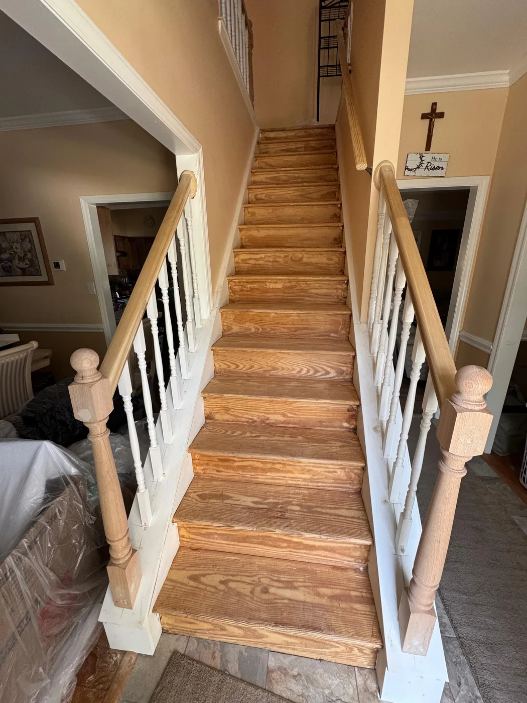 Refinished wood stairs with white risers